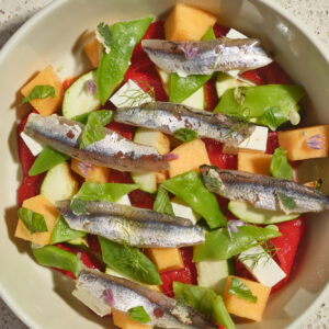 Insalata alici marinate, peperoni arrosto,zucchine,fagiolini,melone e feta