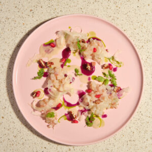 Tartare di branzino, finocchi, melograno e noci
